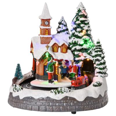 HOMCOM Pueblo Navideño con Luz LED Música y Tren Giratorio 19,3x17,9x20,2 cm Multicolor